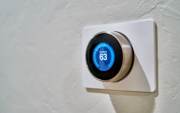 Smart Thermostat on White Wall